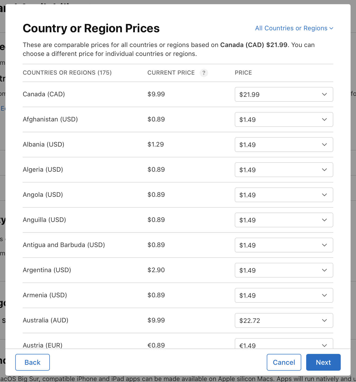 「国または地域における価格」ダイアログのスクリーンショット。基準とする場所以外のすべての国や地域における同等の価格が表示されています。価格はそれぞれ編集可能です。ダイアログ下部の左側に「戻る」ボタン、右側に「キャンセル」と「次へ」のボタンがあります。